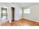 Bedroom with hardwood floors, closet, and hallway view at 2600 Nw Baker Rd, Atlanta, GA 30318