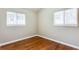 Bright bedroom with hardwood floors and multiple windows at 2600 Nw Baker Rd, Atlanta, GA 30318