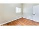 Bedroom with hardwood floors, a window, and a door at 2600 Nw Baker Rd, Atlanta, GA 30318