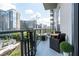 Private balcony offering stunning city skyline views at 40 12Th Ne St # 1004, Atlanta, GA 30309