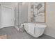 Bathroom with freestanding tub and glass shower at 40 12Th Ne St # 1004, Atlanta, GA 30309