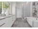 Luxurious bathroom with double vanity and large shower at 40 12Th Ne St # 1004, Atlanta, GA 30309