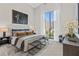 Spacious bedroom with large window and city views at 40 12Th Ne St # 1004, Atlanta, GA 30309