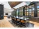 Community room with a large granite island and seating at 40 12Th Ne St # 1004, Atlanta, GA 30309