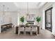 Bright dining area with modern chandelier and hardwood floors at 40 12Th Ne St # 1004, Atlanta, GA 30309