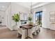 Elegant dining room with hardwood floors and city views at 40 12Th Ne St # 1004, Atlanta, GA 30309