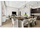 Open concept dining room with kitchen and living room views at 40 12Th Ne St # 1004, Atlanta, GA 30309
