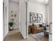 Elegant hallway with sliding doors opening to a living area at 40 12Th Ne St # 1004, Atlanta, GA 30309