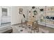 Bright home office featuring glass desk and built-in shelving at 40 12Th Ne St # 1004, Atlanta, GA 30309