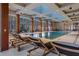 Indoor swimming pool with plenty of lounge chairs at 40 12Th Ne St # 1004, Atlanta, GA 30309