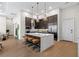 Modern kitchen with island, stainless steel appliances, and hardwood floors at 40 12Th Ne St # 1004, Atlanta, GA 30309