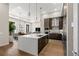 Modern kitchen with island, stainless steel appliances, and quartz countertops at 40 12Th Ne St # 1004, Atlanta, GA 30309