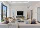 Spacious living room with comfortable seating and city views at 40 12Th Ne St # 1004, Atlanta, GA 30309