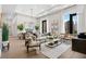 Spacious living room with hardwood floors and city views at 40 12Th Ne St # 1004, Atlanta, GA 30309