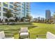 Relaxing community lawn with seating and city views at 40 12Th Ne St # 1004, Atlanta, GA 30309