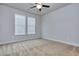 Spacious bedroom with neutral walls and carpeted floors at 6166 Ripple Way # 79, South Fulton, GA 30349