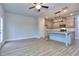 Open living room and kitchen area with luxury vinyl plank flooring at 6166 Ripple Way # 79, South Fulton, GA 30349