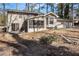 Ranch house with screened porch and two-car garage at 1980 Campfire Dr, Riverdale, GA 30296