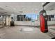 Fitness room with cardio equipment and hanging heavy bag at 3338 Peachtree Ne Rd # 1104, Atlanta, GA 30326