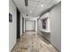 Building hallway with modern flooring and artwork at 3338 Peachtree Ne Rd # 1104, Atlanta, GA 30326