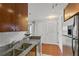 Kitchen with granite countertops and double sink at 3338 Peachtree Ne Rd # 1104, Atlanta, GA 30326