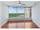 Living room featuring hardwood floors and large windows at 3338 Peachtree Ne Rd # 1104, Atlanta, GA 30326