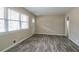 Bright and airy living room showcasing wood floors, large windows, and freshly painted walls at 3482 Scenic Dr, Atlanta, GA 30344