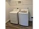 Laundry room equipped with washer and dryer, offering both convenience and functionality at 485 N Oakland Cir, Mcdonough, GA 30253