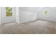 Bright bedroom with window and carpet flooring at 485 N Oakland Circle, Mcdonough, GA 30253