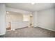 Upstairs bedroom with wall-to-wall carpeting at 576 Rodeo Dr, Auburn, GA 30011