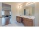 Bathroom with double sinks and a large mirror at 601 Rangeley Meadows Ct, Hampton, GA 30228