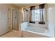 Bathroom with shower and bathtub at 601 Rangeley Meadows Ct, Hampton, GA 30228