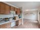 Home office features built-in cabinets and wood flooring at 601 Rangeley Meadows Ct, Hampton, GA 30228