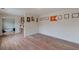 Home office featuring wood floors and ample wall space at 601 Rangeley Meadows Ct, Hampton, GA 30228