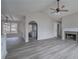 Open living space with hardwood floors and a fireplace at 82 Summer Creek Pl, Dallas, GA 30157