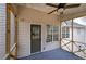 Screened porch with exterior access and ceiling fan at 82 Summer Creek Pl, Dallas, GA 30157