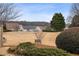 Community green space with benches and mature trees at 1440 Vinery Ave, Cumming, GA 30041