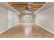 Finished basement with tile flooring and wood accent ceiling at 3335 Pinta Way, Douglasville, GA 30135