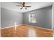 Bright bedroom with hardwood floors and gray walls at 3335 Pinta Way, Douglasville, GA 30135