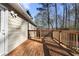 Spacious wooden deck overlooking a wooded backyard at 3335 Pinta Way, Douglasville, GA 30135