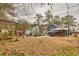 Large backyard with mature trees at 6300 Creekford Dr, Lithonia, GA 30058