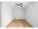 Simple bedroom with light gray walls and light brown floors at 6300 Creekford Dr, Lithonia, GA 30058