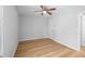 Bedroom with wood-look floors and ceiling fan at 6300 Creekford Dr, Lithonia, GA 30058