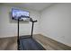 Basement home gym with treadmill and other workout equipment at 1265 Gallatin Way, Suwanee, GA 30024