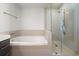 Spa-like bathroom with soaking tub and glass shower at 1820 Peachtree Nw St # 1909, Atlanta, GA 30309