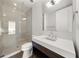 Modern bathroom with a glass shower, updated vanity, and tile flooring at 1820 Peachtree Nw St # 1909, Atlanta, GA 30309