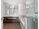 Modern bathroom with double vanity and soaking tub at 1820 Peachtree Nw St # 1909, Atlanta, GA 30309