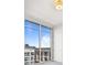 Bedroom with city view and floor to ceiling windows at 1820 Peachtree Nw St # 1909, Atlanta, GA 30309