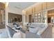 Elegant community space with plush seating and a large TV at 1820 Peachtree Nw St # 1909, Atlanta, GA 30309