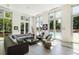 Relaxing community lounge area with comfortable seating and pool views at 1820 Peachtree Nw St # 1909, Atlanta, GA 30309